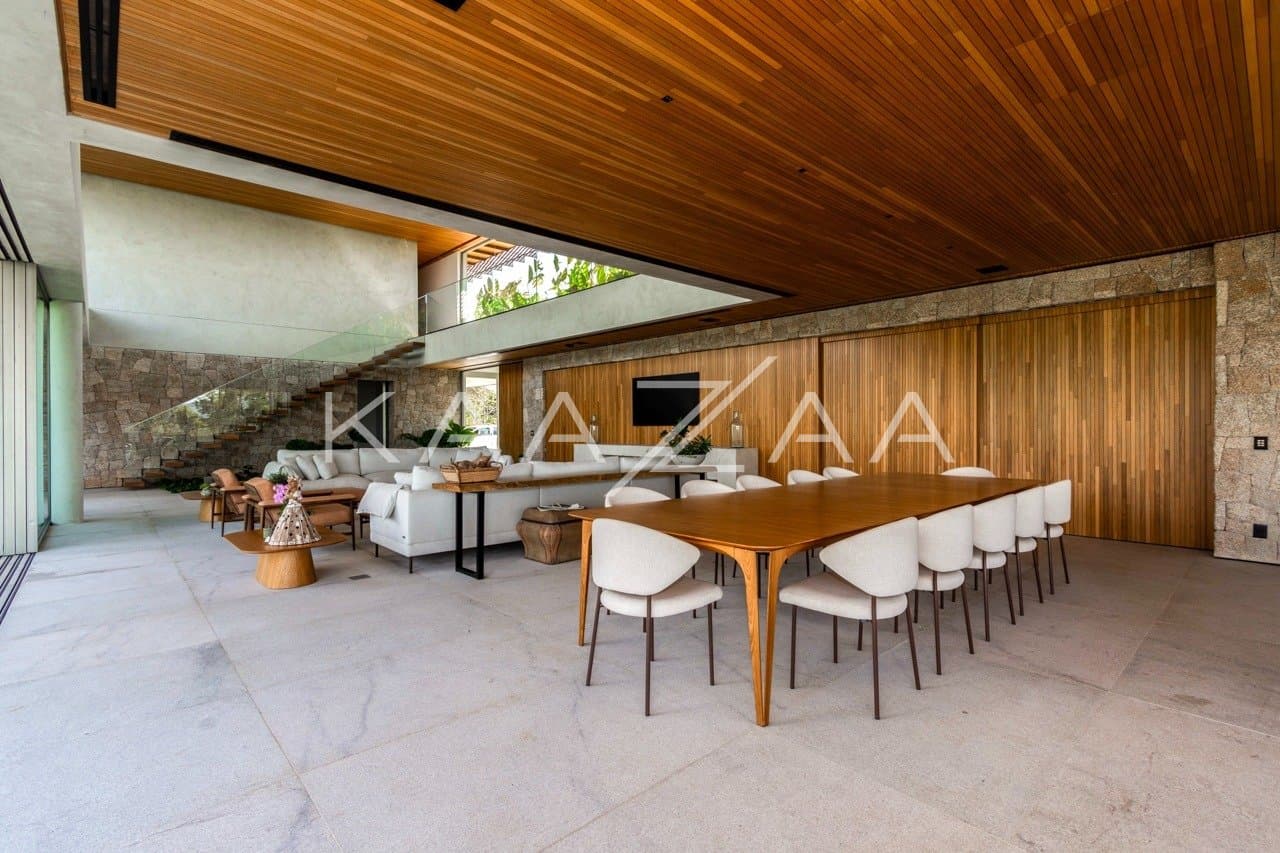 Casa contemporânea feita para interagir com a natureza ao redor. Projeto na Quinta da Baroneza. - Foto 19