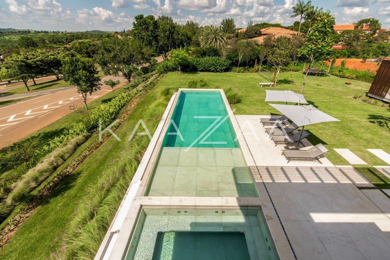 Casa contemporânea feita para interagir com a natureza ao redor. Projeto na Quinta da Baroneza. - Foto 27